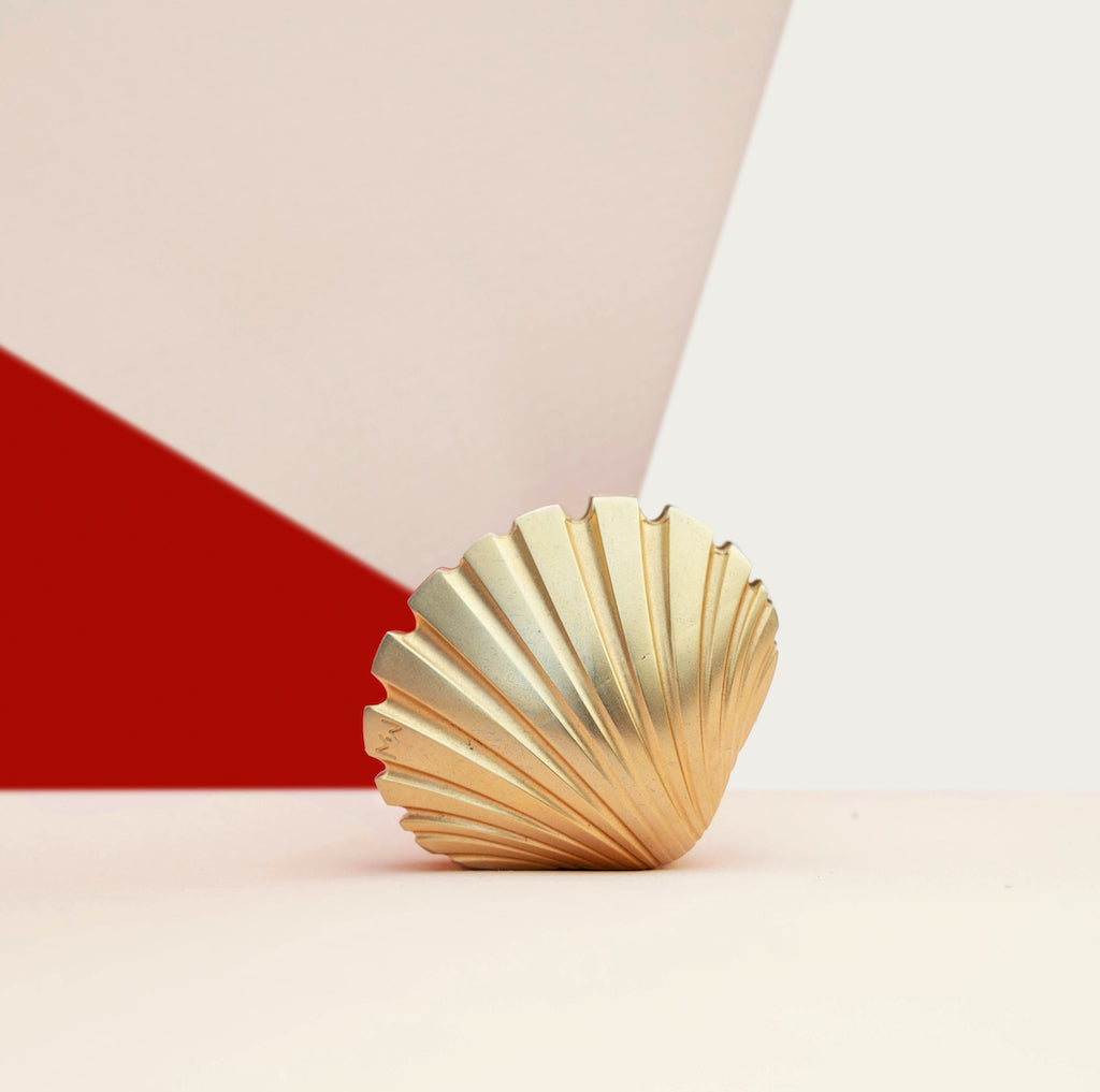 Gold seashell grinder from MISSWEED
